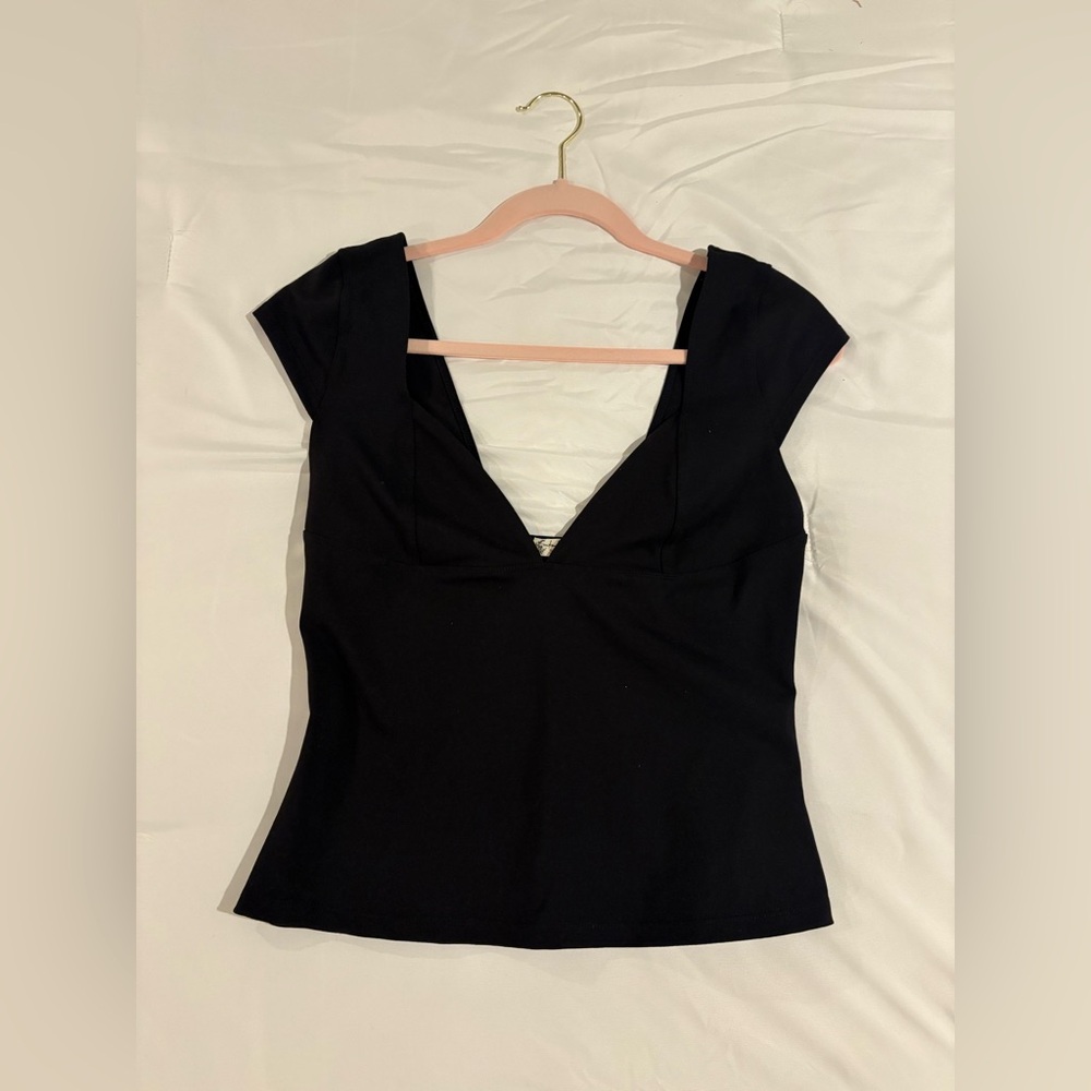 Black v-neck body con shirt
